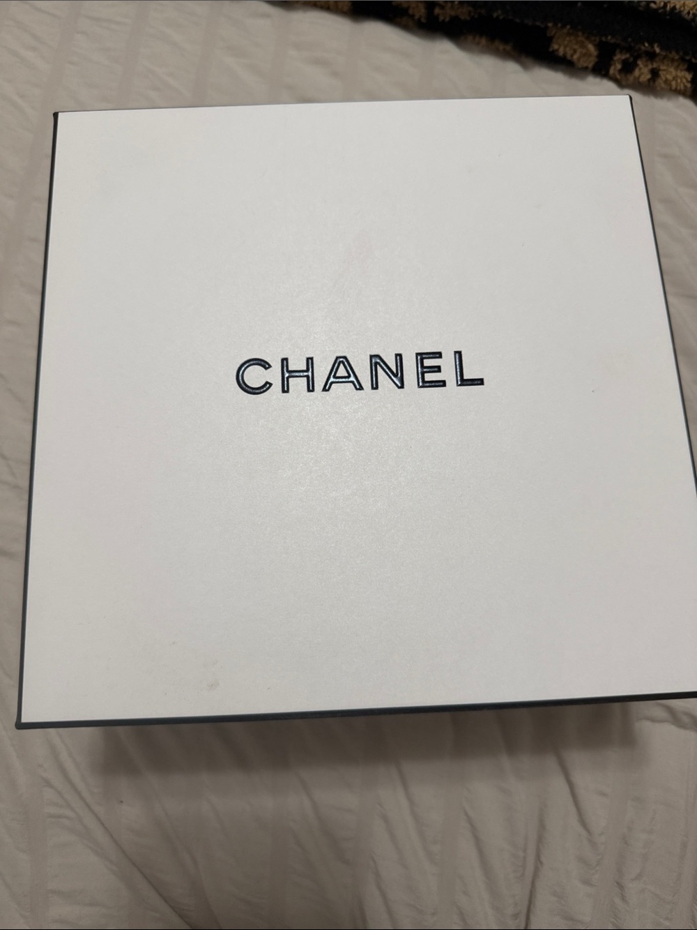 CHANEL White Box with Black Logo and Edge 
Authentic 
Sizes 9x9x4 and 11x11x5